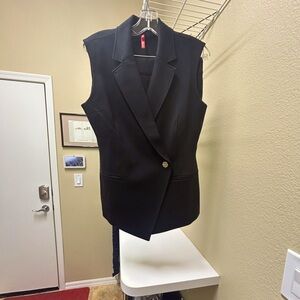 Spanx long asymmetrical vest and Bermuda shorts. Black size medium.